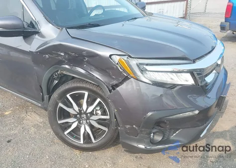 2019 Honda Pilot Touring z USA, uszkodzony, nr VIN 5FNYF5H93KB028641